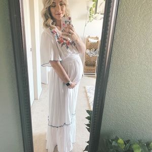 White maxi dress with floral embroidery